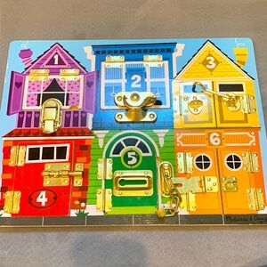 Melissa and Doug latches board, gently used